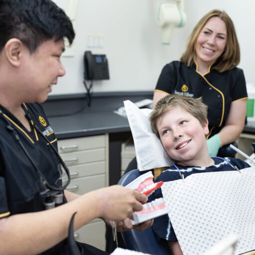 Children's dentist Toorak demonstrating oral hygiene tips for kids at Toorak Village Dental Care