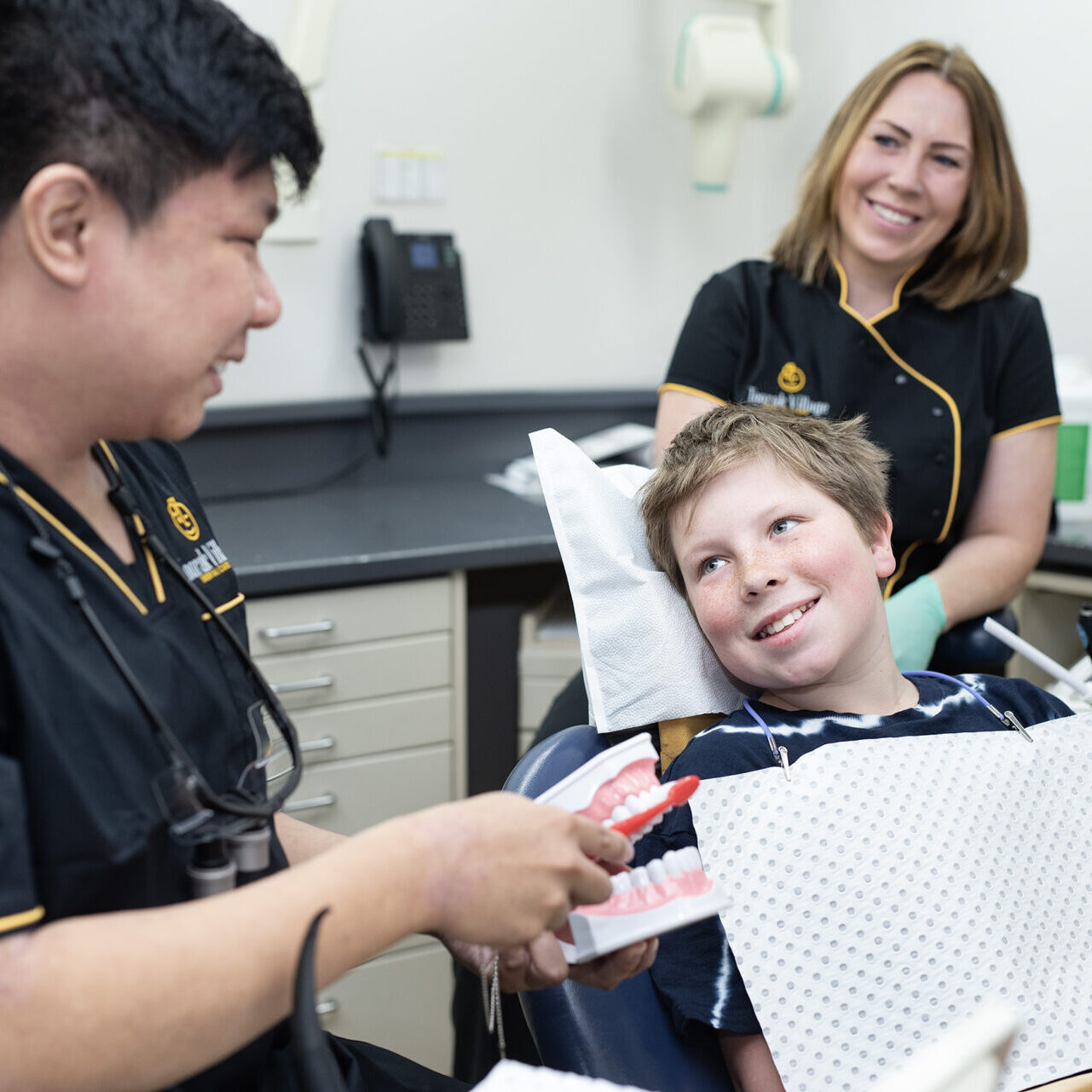 Children's dentist Toorak demonstrating oral hygiene tips for kids at Toorak Village Dental Care